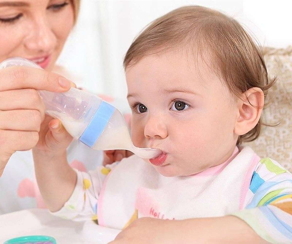 Silicone Squeeze Baby Feeding Bottle With Spoon Cap